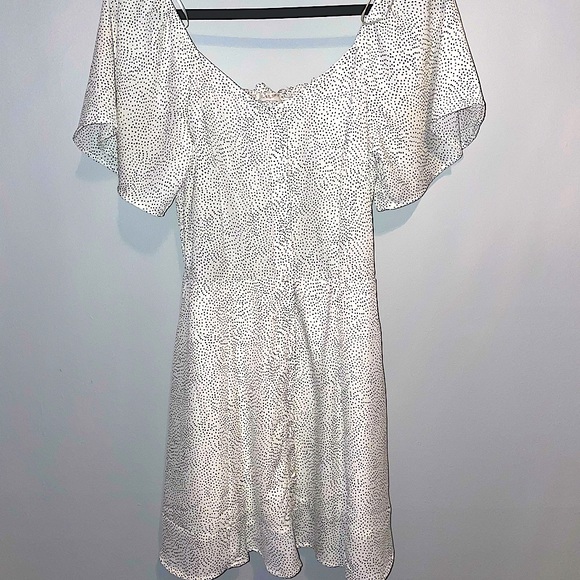 Dresses & Skirts - White mini dress with black polka dots